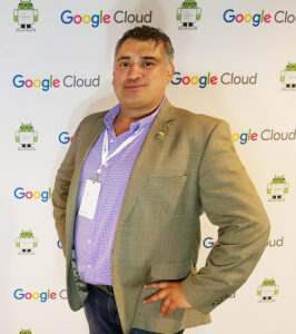 Man in suit at Google conference