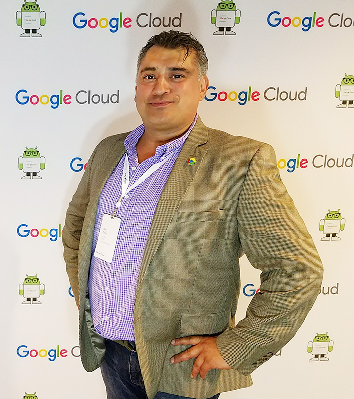 Man in suit at Google conference